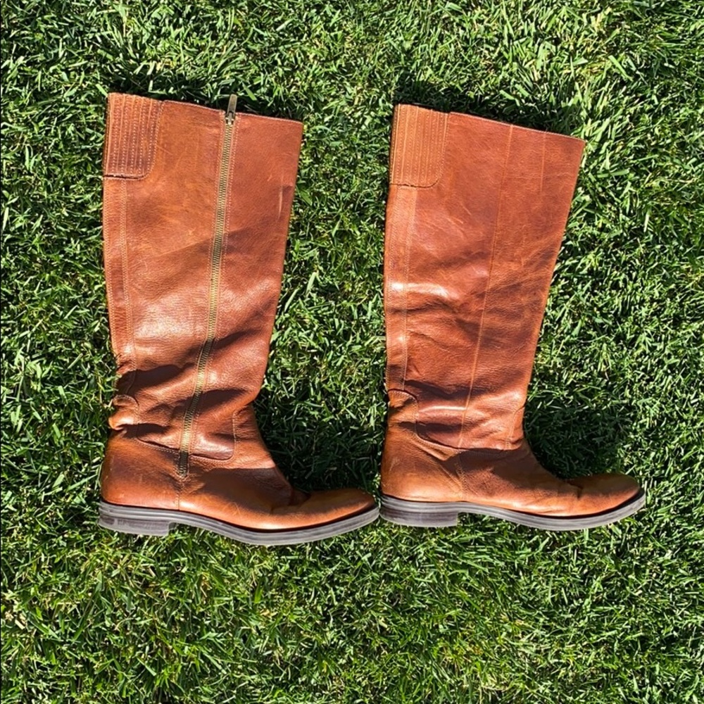 Tall brown leather boots